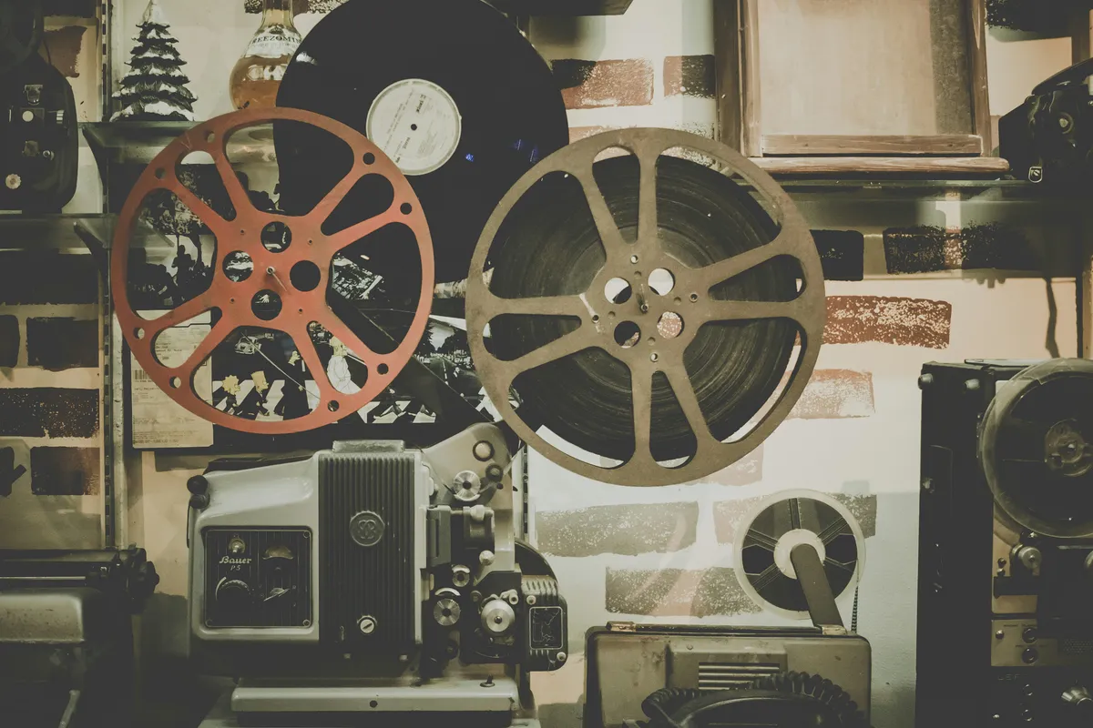 Vintage Film Projector with Reels - Mid-Century Cinema