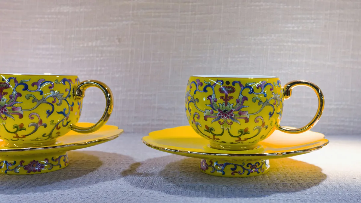 Pair of Yellow Enamel Teacups with Saucers, Decorative Arts